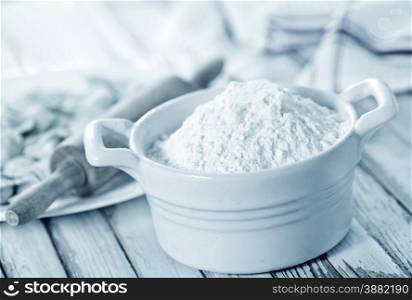 flour in bowl and on a table