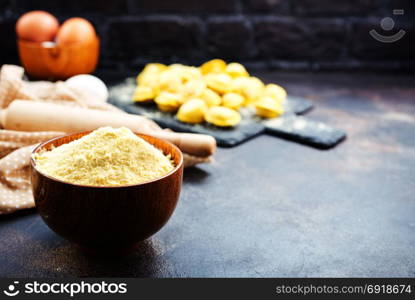 flour in bowl and on a table