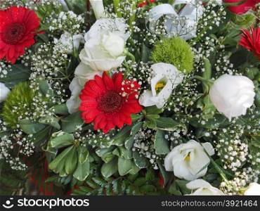 Flower bouchet. Flower bouchet with red daisies and white roses