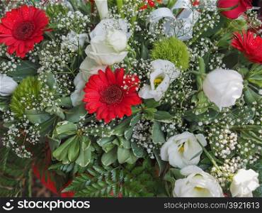 Flower bouchet. Flower bouchet with red daisies and white roses