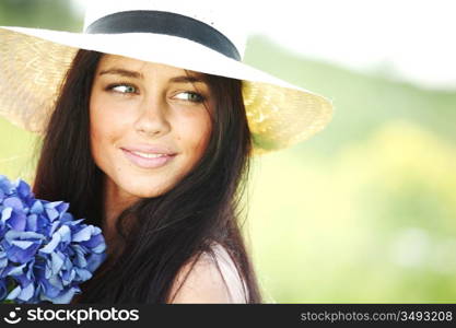 flower in woman hands close up