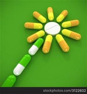 Flower made from medical capsules - concept of homeopathic medicine