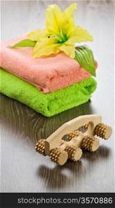 flower on towels with massager