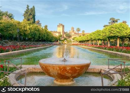 Flowering gardens and fountains of the Alcazar de los Reyes Cristianos, Cristian royal palace of the Kings, Cordoba, Andalusia, Spain.