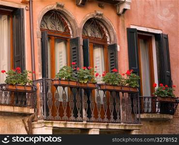 Flowers along balcony in Venice