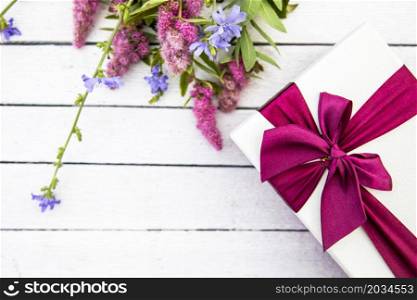 flowers gift wooden background