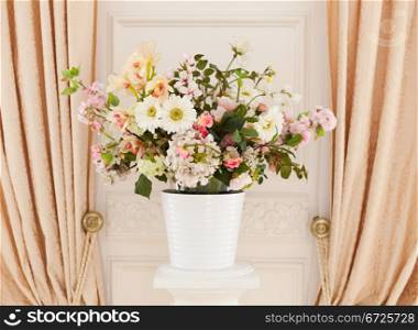 Flowers in white flowerpot