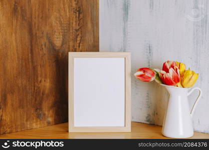 flowers near frame shelf