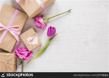 flowers with gift boxes table