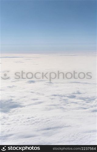 fluffy clouds seen from airplane