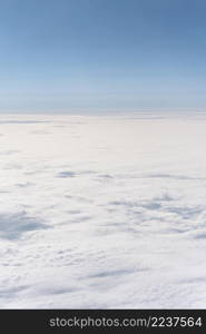 fluffy clouds seen from airplane