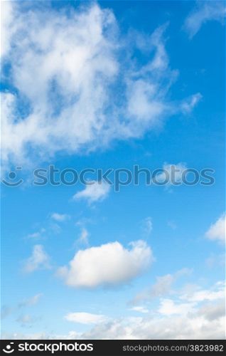 fluffy white clouds in blue spring sky in Kuban region