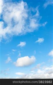 fluffy white clouds in blue spring sky in Kuban region