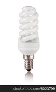 fluorescent light bulb. Energy saving fluorescent light bulb isolated on a white bakground