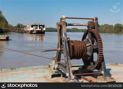 Fluvial Port: Rusted and Old Manual Naval Winch. Fluvial Port: Rusted and Old Manual Naval Winch.. Fluvial Port: Rusted and Old Manual Naval Winch