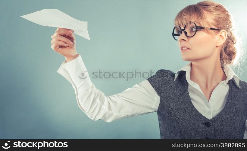 Fly fear metaphor, aerophobia concept. Business woman holding airplane in hand instagram photo