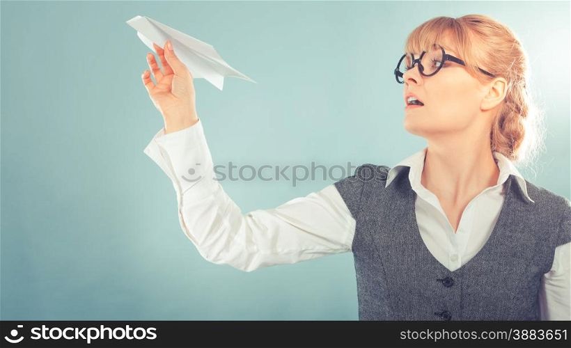 Fly fear metaphor, aerophobia concept. Business woman holding airplane in hand instagram photo