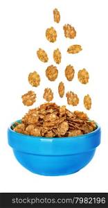 Flying corn flakes in a bowl isolated on white background.