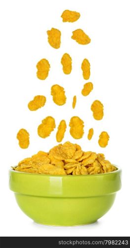 Flying corn flakes in a bowl isolated on white background
