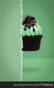 Flying cupcakes on green background, idea minimal concept for new year, christmas holliday.