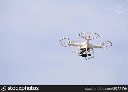 Flying drone in the sky. Flying with an drone for video and photo productions.
