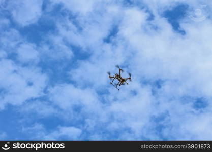 flying drone with camera on the sky