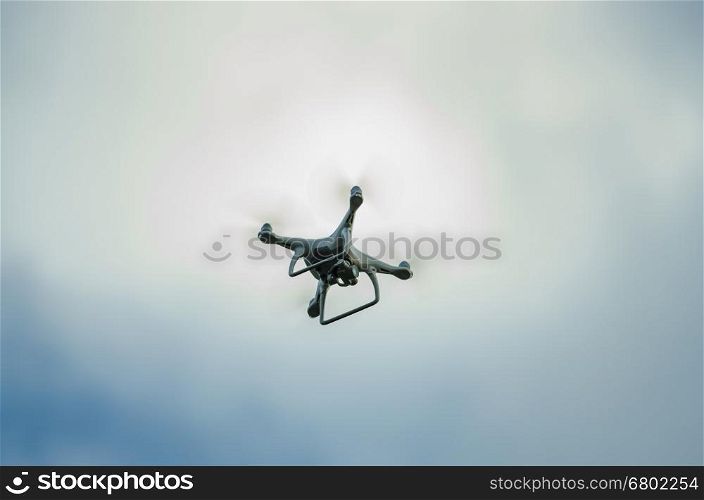 flying drone with camera on the sky