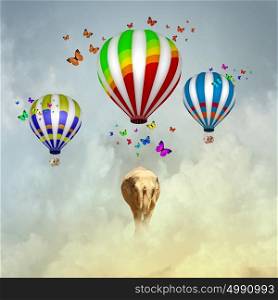 Flying elephant. Elephant flying in sky on colorful aerostat