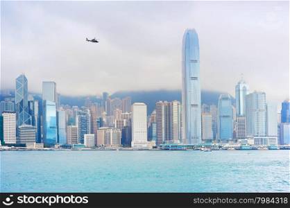 Flying helicopter above the Hong Kong downtown