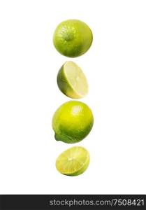 Flying lime, isolated on white background. Healthy food. Vertical