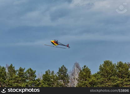 Flying radio-controlled 3D helicopter down the screw