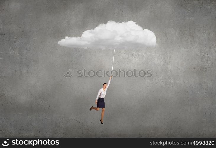 Flying woman. Young determined businesswoman flying high in sky on cloud