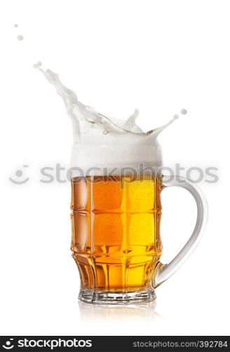 Foam splash in beer mug isolated on white background. Foam splash in beer mug