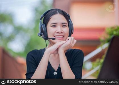 Focus microphone Asian women working from home call center service consult support,Business Work new normal