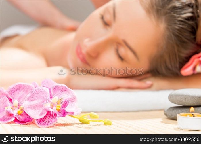 focus on the flowers of orchids on the table in cabinet spa