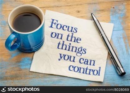 Focus on the things you can control - advice on a napkin with cup of coffee