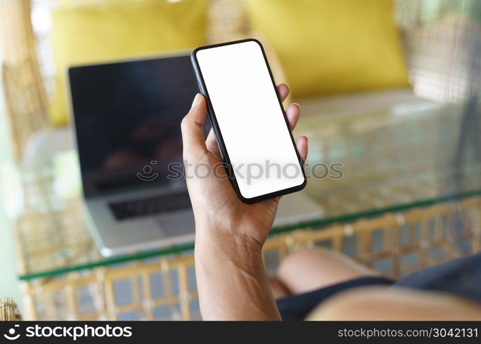 focus on women hand holding phone white screen