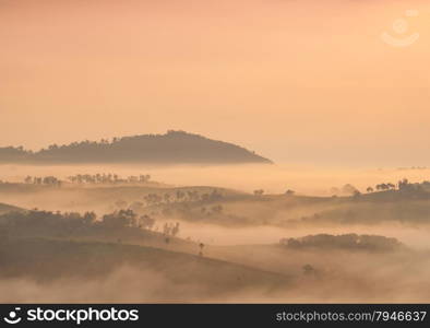 Fog covered mountains and forest in the morning. Northern Thailand is cold and cool in the morning.