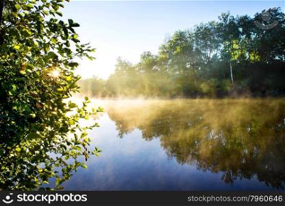 Fog on the morning river in late summer