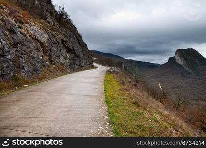 Fog on the Paved Road through a Mountain Pass in the Pyrenees