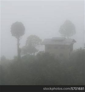 Fog over landscape in Bhutan, Punakha Valley