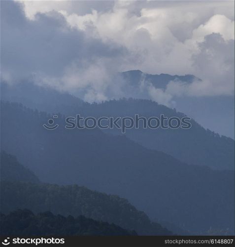 Fog over mountain range, Dochula Pass, Thimphu, Bhutan