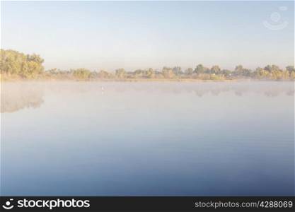 foggy lake on a cold fall morning, RIverbend Ponds Natural Area, Fort Collins, Colorado