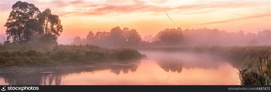 Foggy river in the morning. Panorama