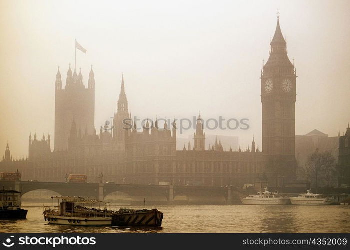 Foggy view of Big Ben and Parliament in London, England