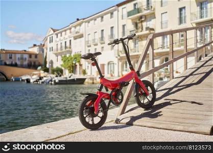         Foldable e-bike in port                       