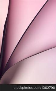 Folded backlit paper abstract pastel shapes suitabe as wallpaper. . Shallow depth of field.