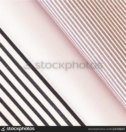 folded black pink stripes fabric