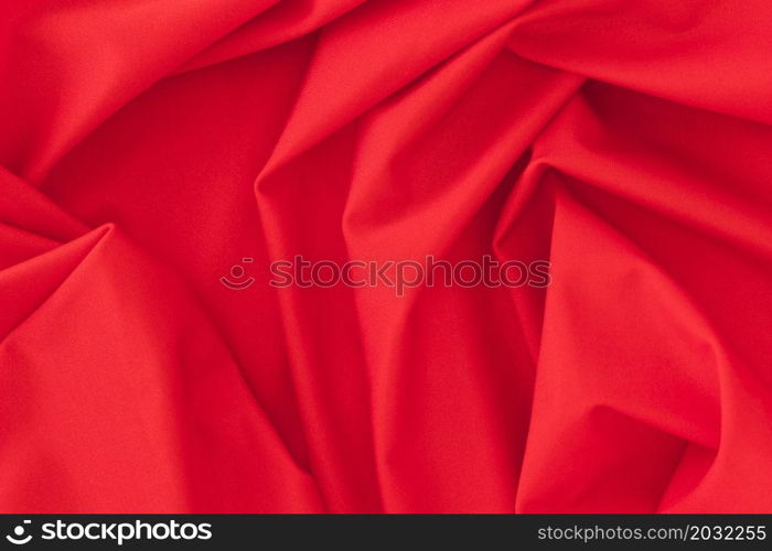 folded red textile fabric texture background