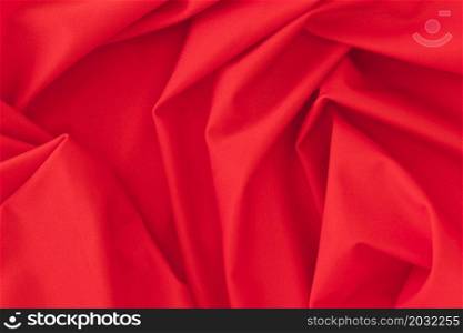 folded red textile fabric texture background